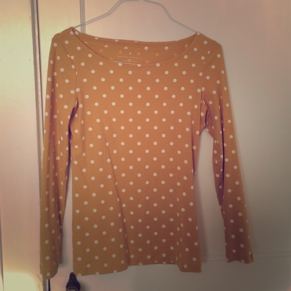 Mustard yellow polka dot top.