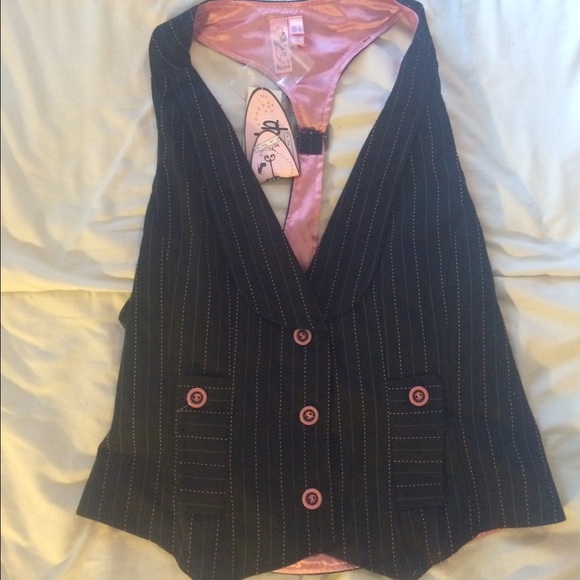 Black & pink pinstriped vest with buckle in back.