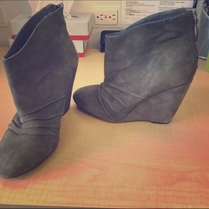Stylish suede gray wedge booties by Marco Santi.