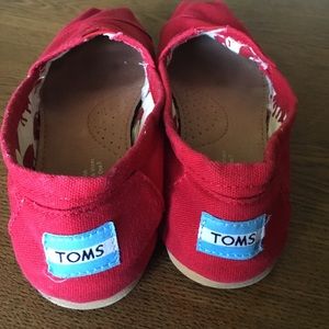 TOMS red slip ons