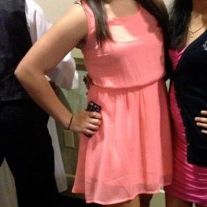 Bright peach colored dress
