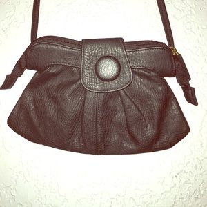 Small black handbag.