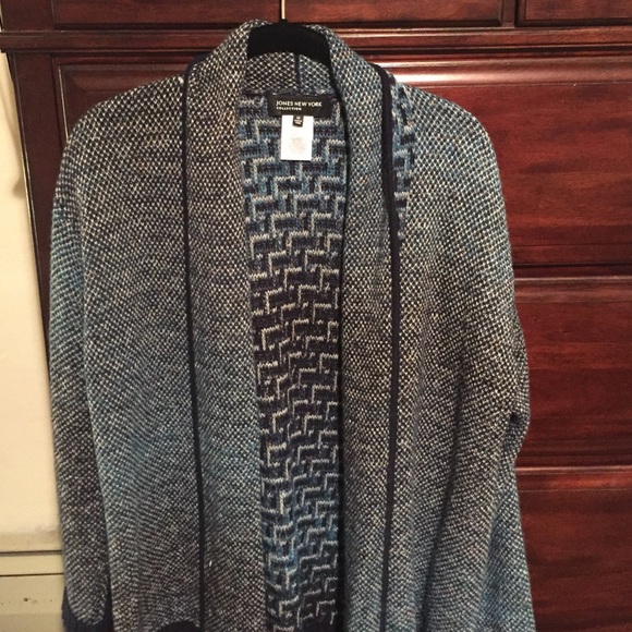 This is an aqua, blue colored sweater - Picture 1 of 3