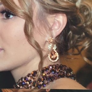 Bronze colored earrings.