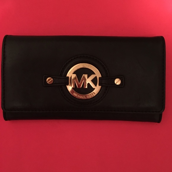 Michael Kors, black leather with gold wallet