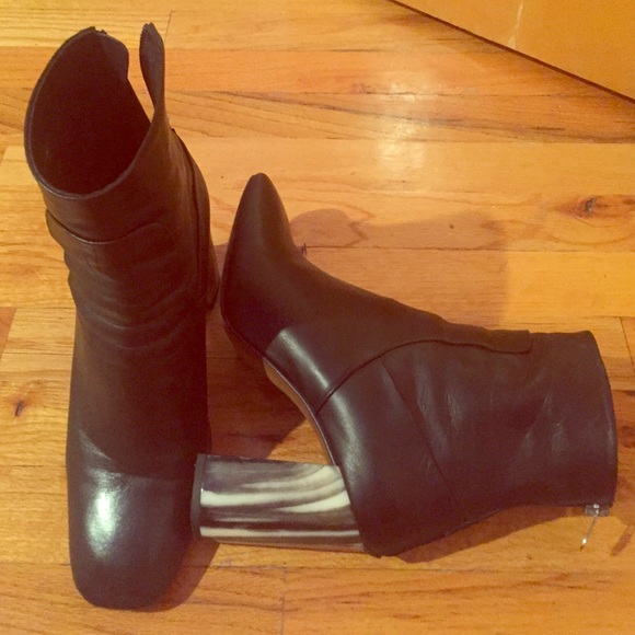 Booties with funky heel.