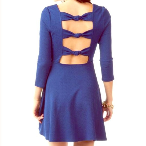 Blue open back dress from Francesca's Collection.