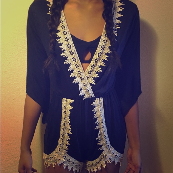 Navy blue romper w/ white trim