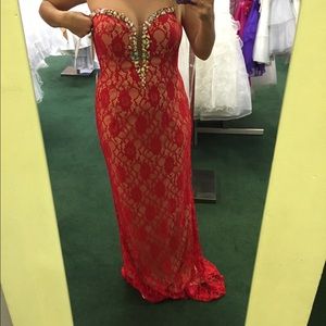 Red, lace prom dress with beading on neckline
