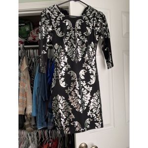 Black bodycon dress with silver sequin accents