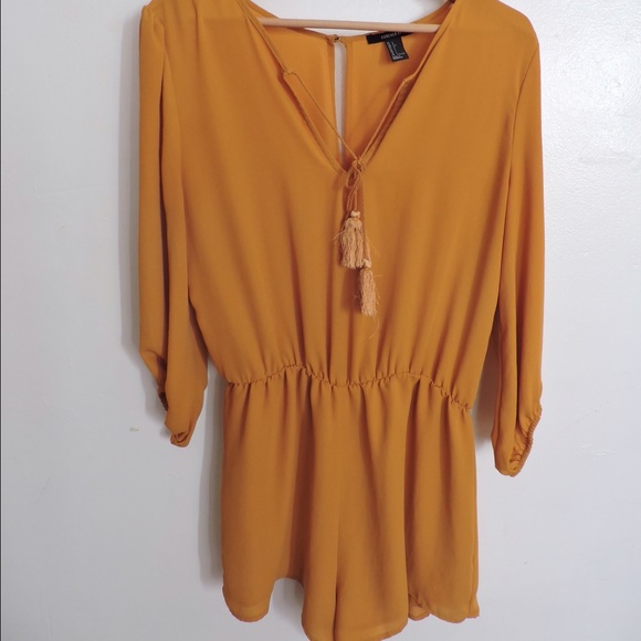 Mustard Yellow Romper with tassel in front
