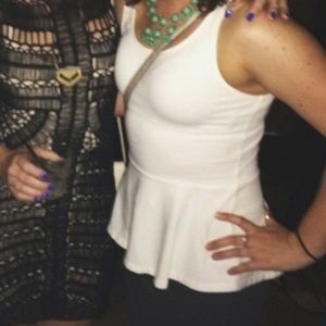 White peplum top
