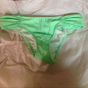 VS green bathing suit bottoms
