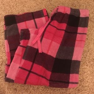 Pink plaid pajama pants.