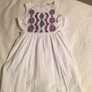 Adorable embroidered cut out dress.