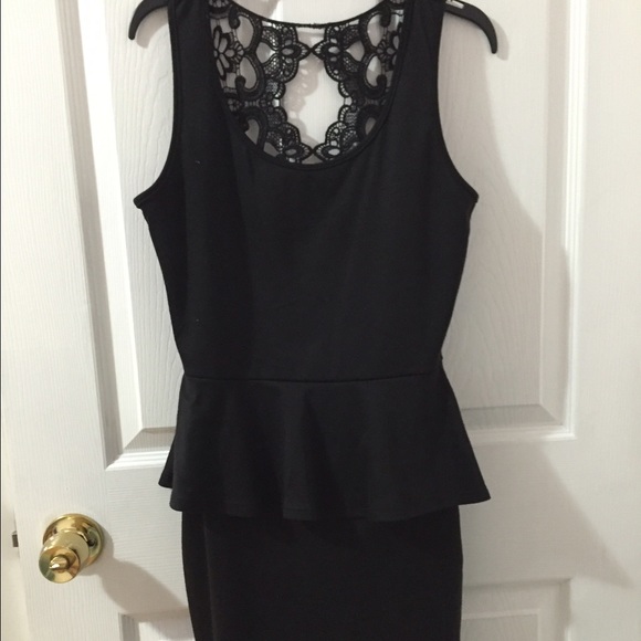 Black peplum dress with unique back