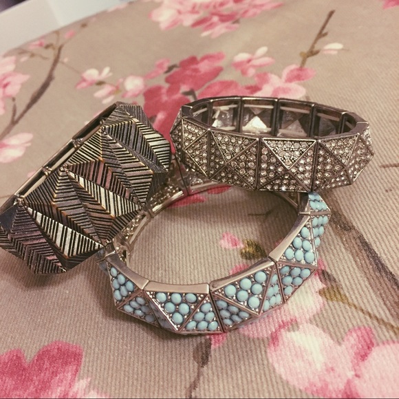 Set of three textured stud silver bracelets