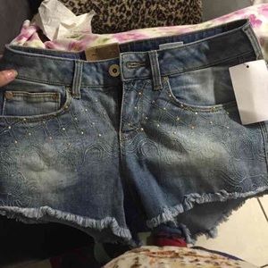 gold studded denim shorts