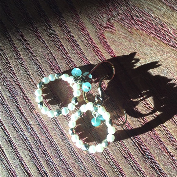 Pierced gold and pearl earrings
