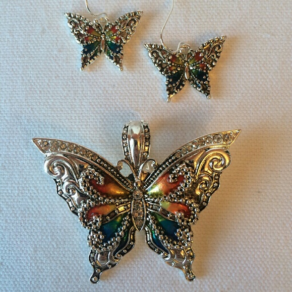 Bold butterfly pendant and matching earrings.