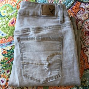 american eagle grey ripped skinny crops