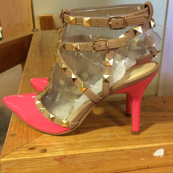 Pink pointy toed studded heels