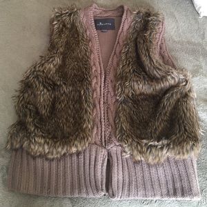 Knitted fur vest.