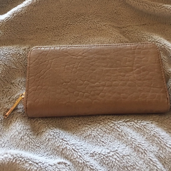 Tan leather clutch