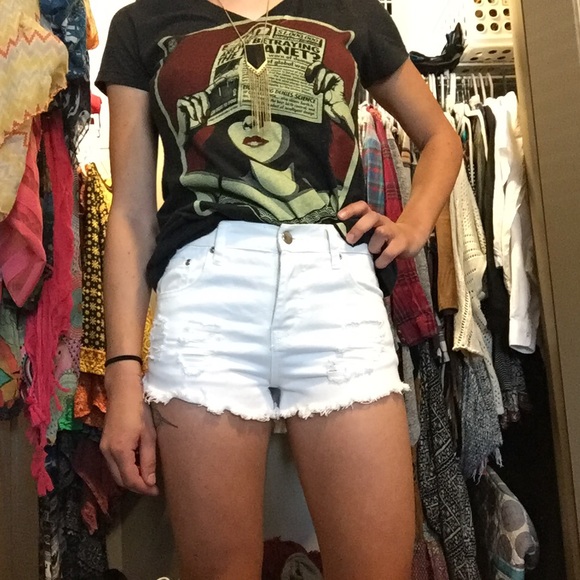 Ripped white shorts