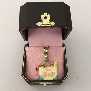 Juice Couture gold beach bag charm