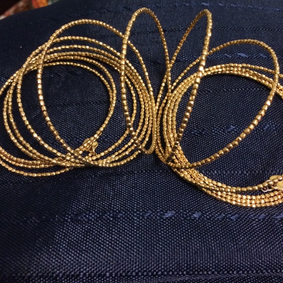 Gold spiral bangle