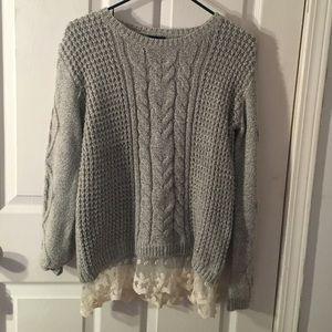 Gray sweater.