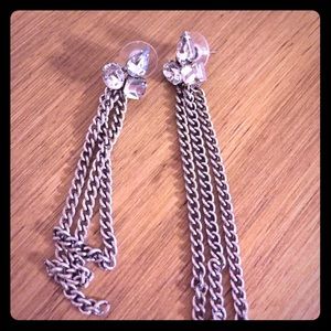 Dangling silver earrings with clear stones