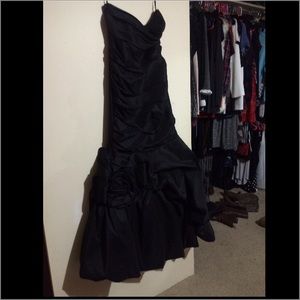 Prom dress. Needs to be sewed in the back.