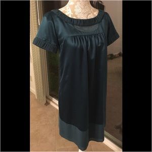 Green yoke style dress with sleeves