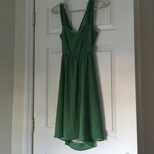 Green open back dress