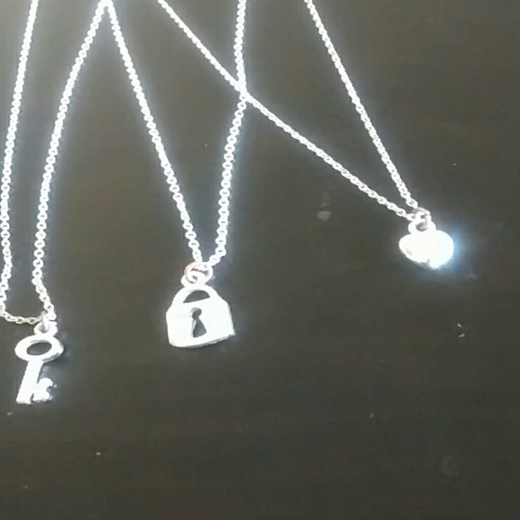 Jewelry - Three silver charm necklaces