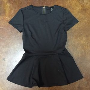 Forever 21. Black peplum top. Size small.