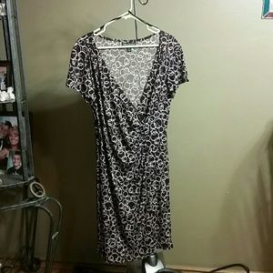 Look like a wrap dress . Very flattering