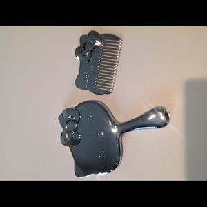 Hello kitty hand held mirror and comb by Sanrio