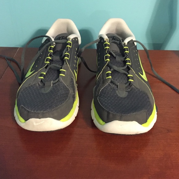 Lime green, grey, and white nike sneakers