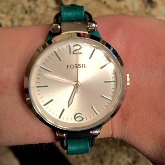 Green fossil brand watch