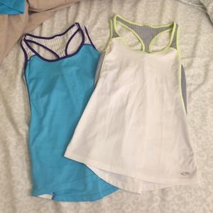 TWO loose fitting workout tanks (razor back)