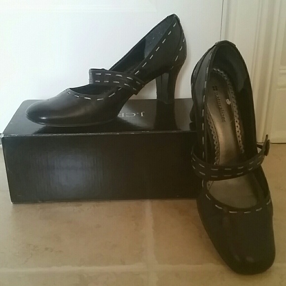 Black Leather Naturalizers trimmed in white.