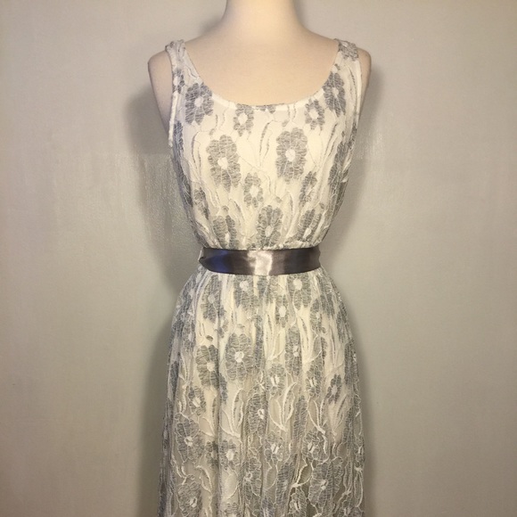 Asymmetrical dress with lace overlay