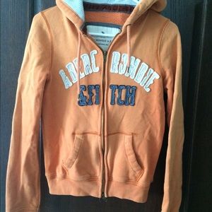 Orange Abercrombie and Fitch zip up hoodie
