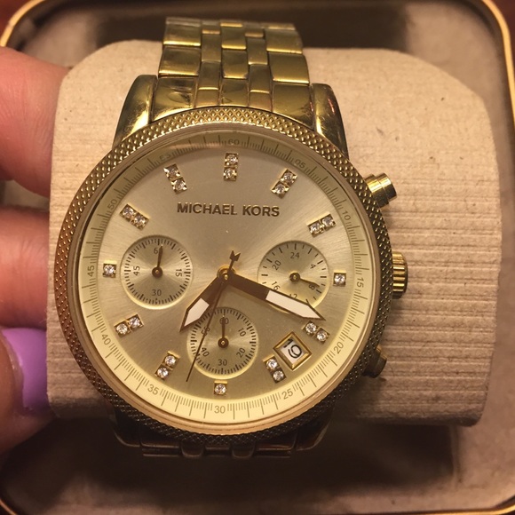 MK gold watch