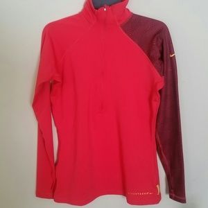 Black, red and yellow shirt.