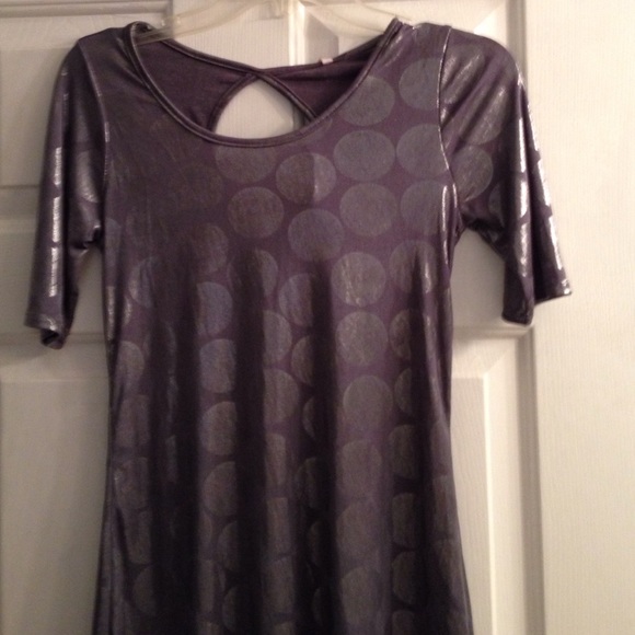 Gorgeous silver shiny shirt.