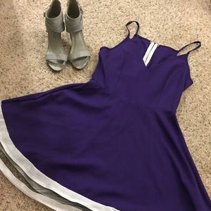 Beautiful purple skater dress with mesh cutout hem